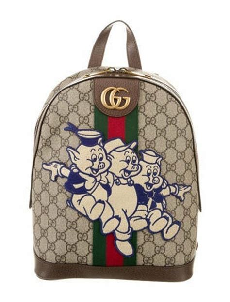 gucci x disney pig backpack|Gucci three little pigs logo.